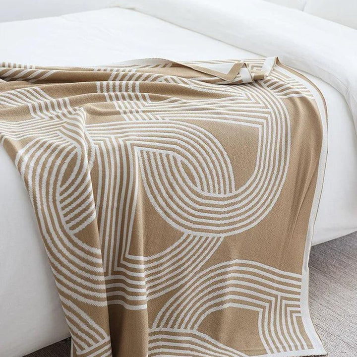 Reversible Strickdecke mit Labyrinthmuster