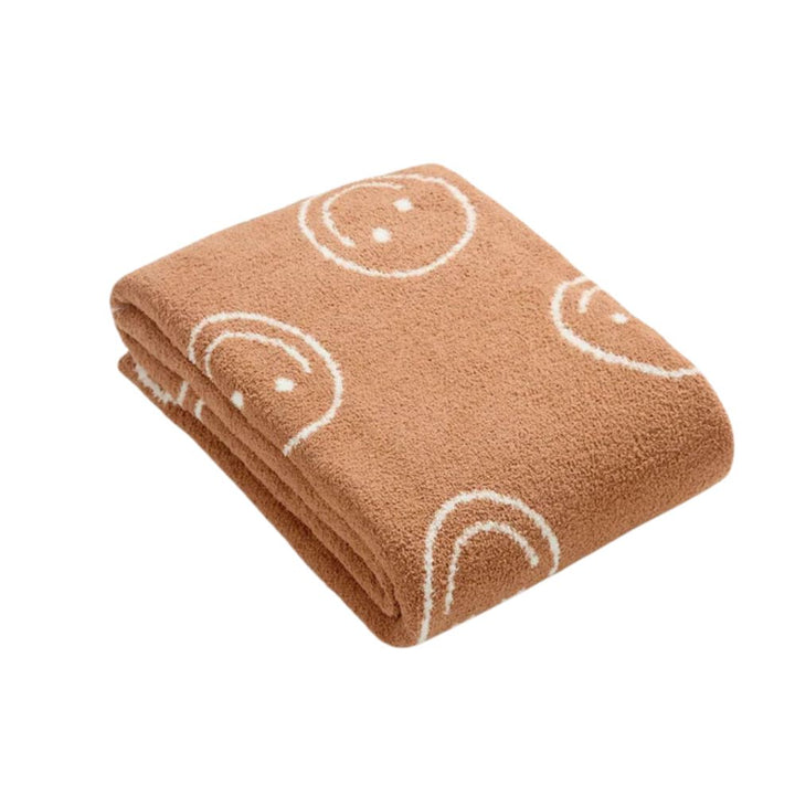 Gestrickte Decke mit Smiley-Muster