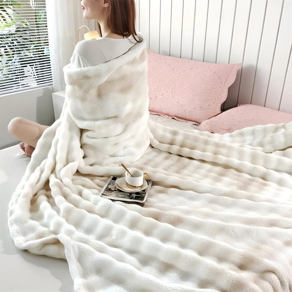 Kuscheldecke aus Kunstfell mit Batikmuster