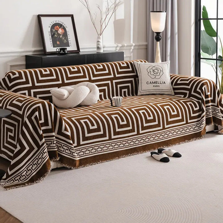 Chenille-Sofadecke mit Mäandermuster und Quasten