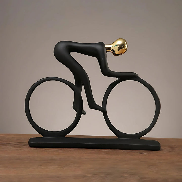 Metallskulptur eines Radfahrers