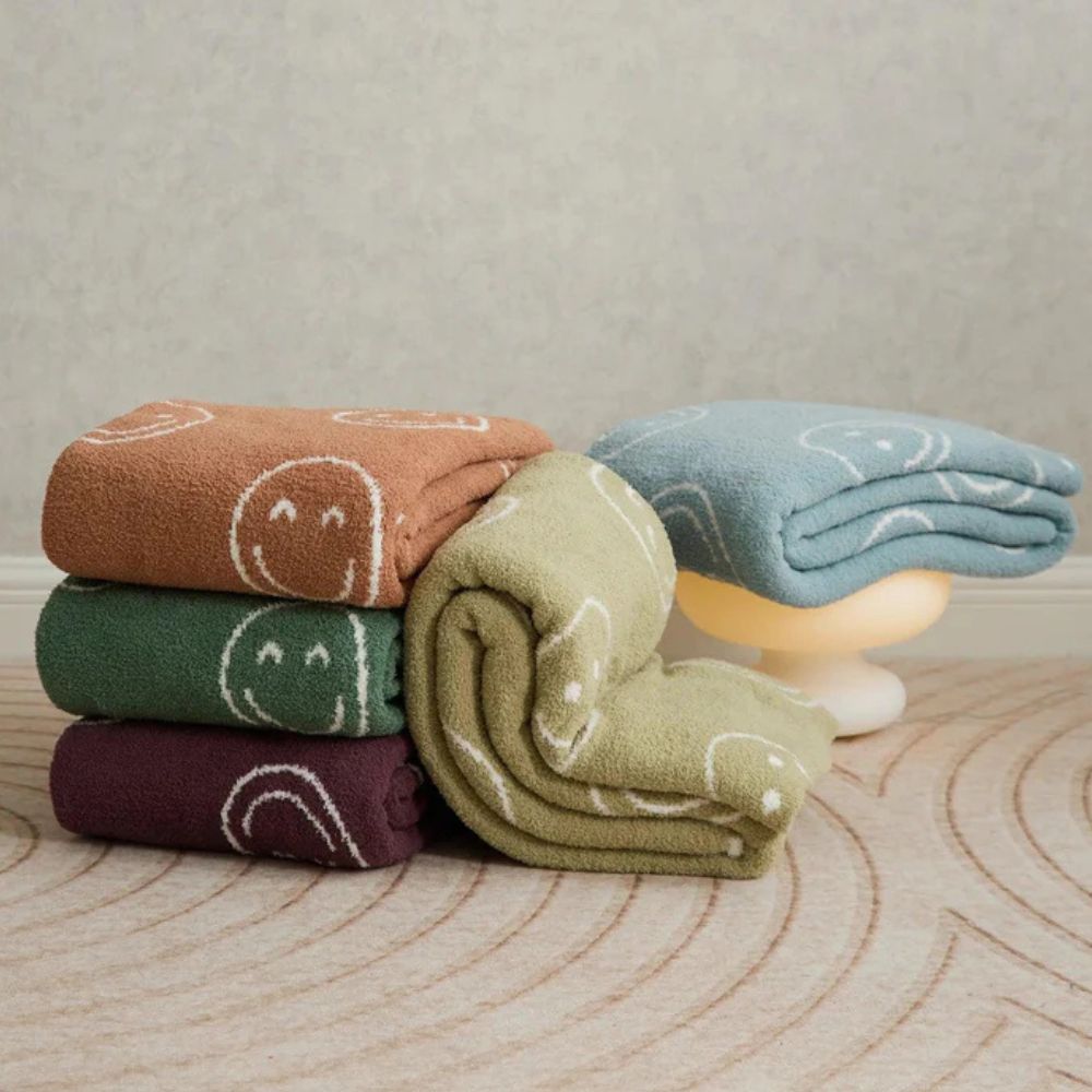 Gestrickte Decke mit Smiley-Muster