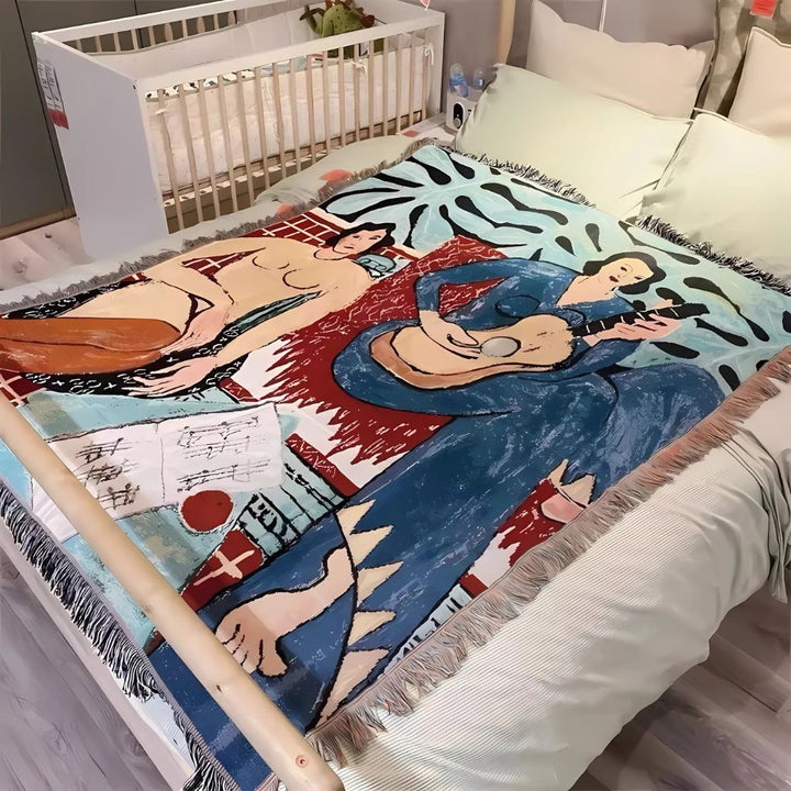 Baumwoll-Wohndecke mit abstrakten Figuren und Quasten