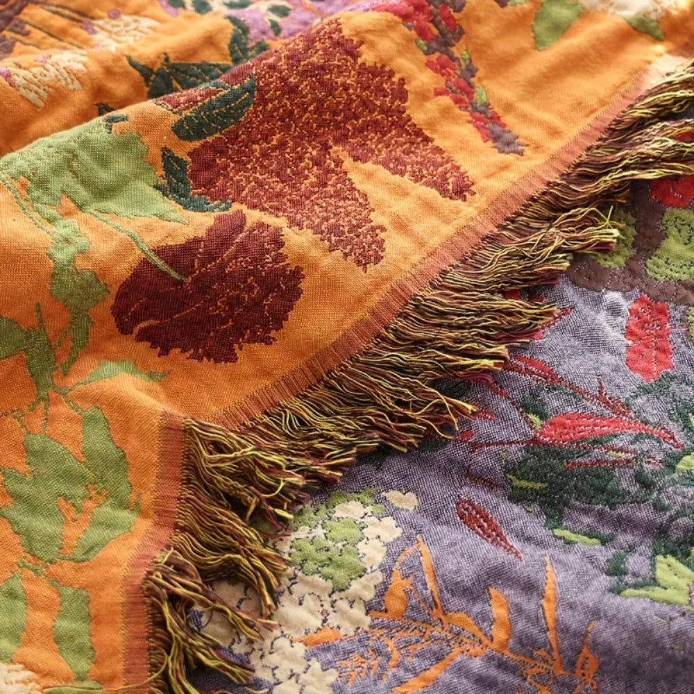 Wendbare Tagesdecke aus floralem Baumwoll-Jacquard mit Quasten