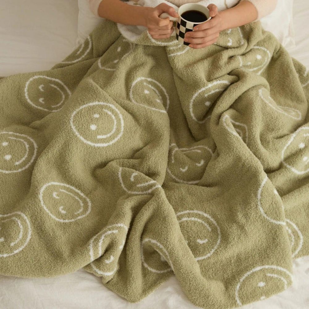 Gestrickte Decke mit Smiley-Muster