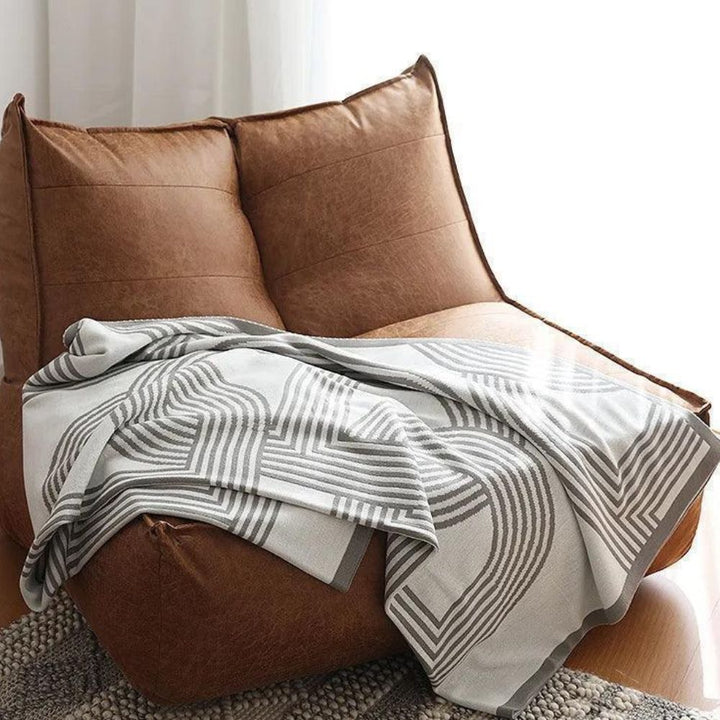 Reversible Strickdecke mit Labyrinthmuster