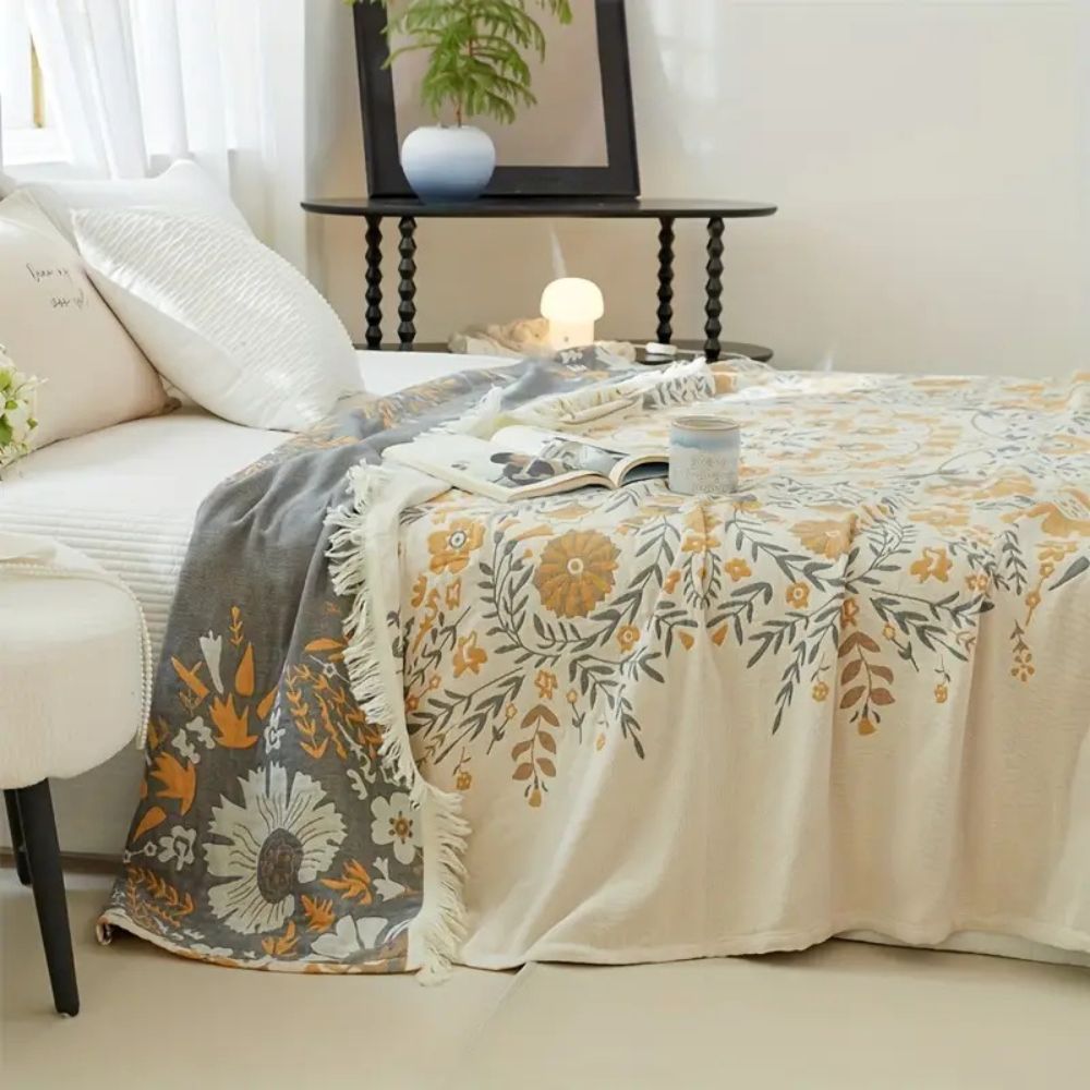 Wendbare Baumwolldecke mit ornamentalem Blumenmuster