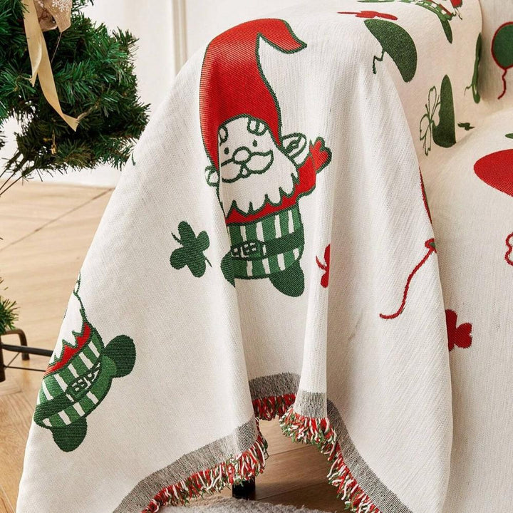 Gesteppter Sofaüberwurf mit Weihnachtswichteln