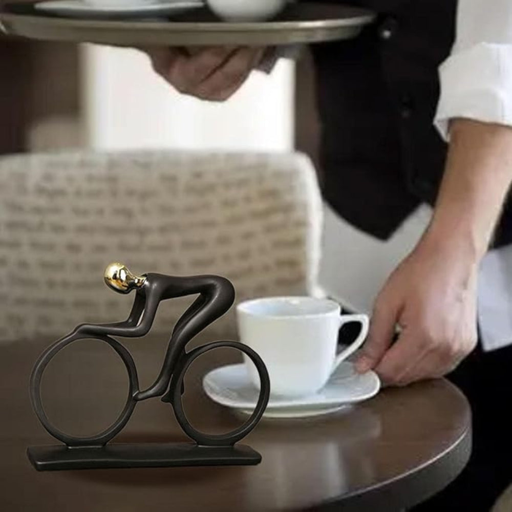 Metallskulptur eines Radfahrers
