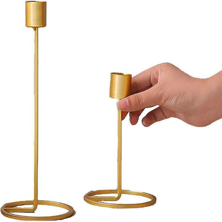 Kerzenhalter aus goldfarbenem Metall