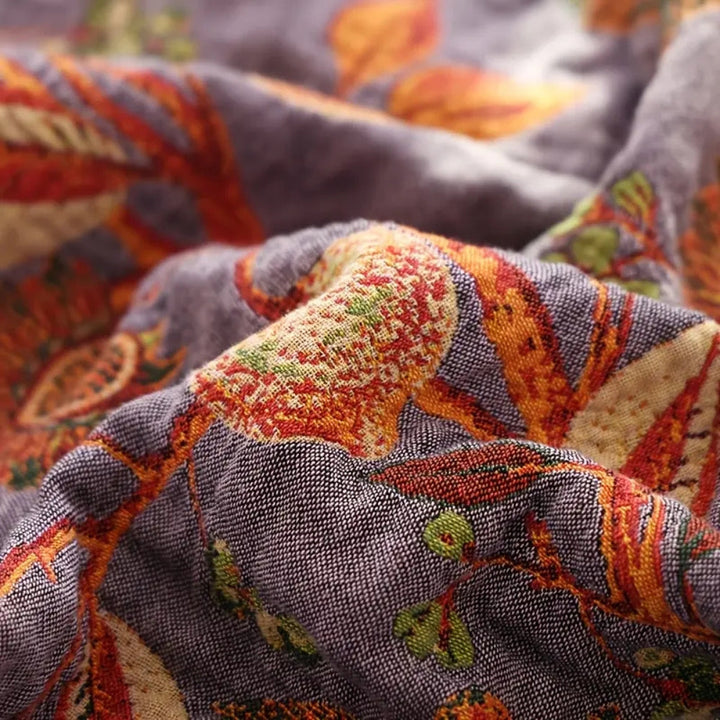 Wendbare Tagesdecke aus floralem Baumwoll-Jacquard mit Quasten