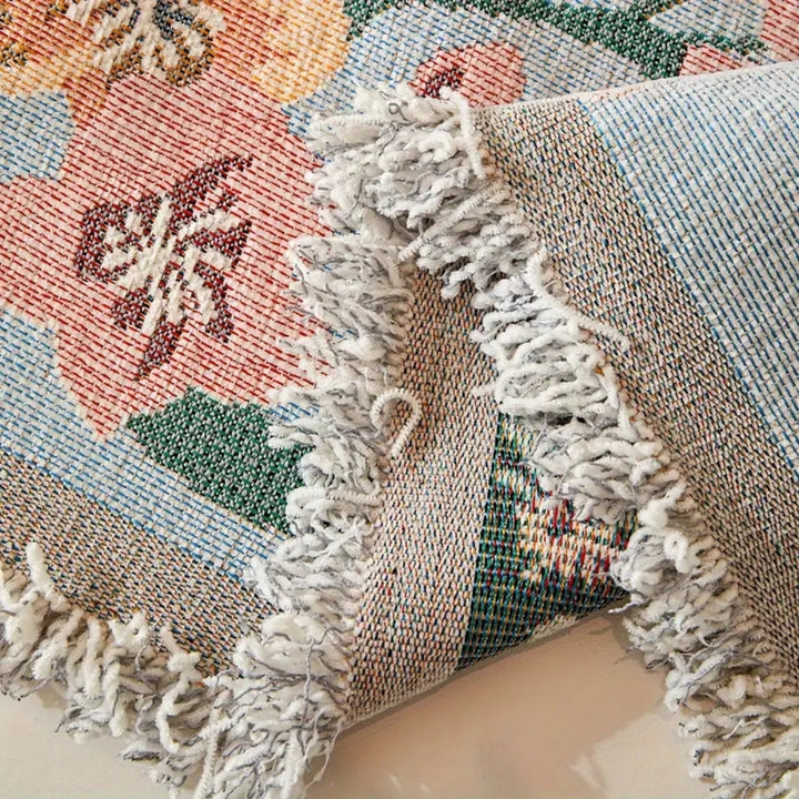 Wendbarer Sofaüberwurf aus floralem Jacquard