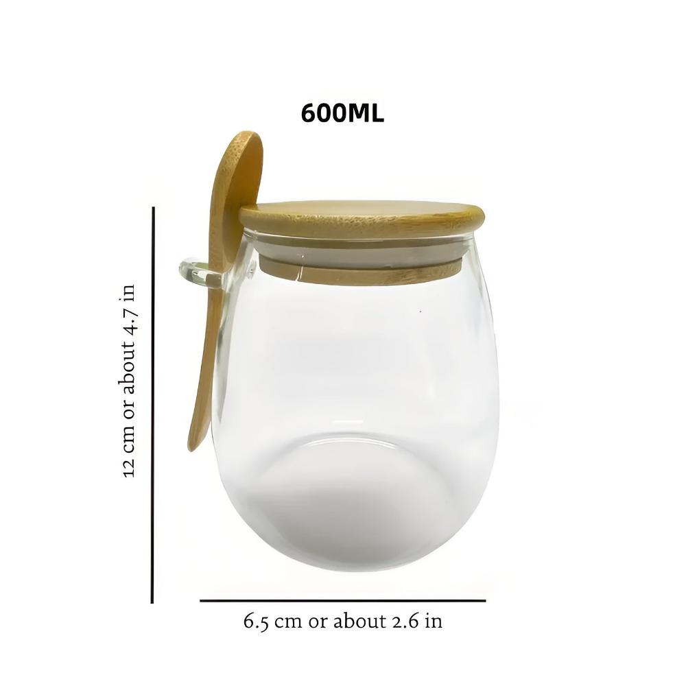 Vorratsglas mit Holzdeckel und Löffel