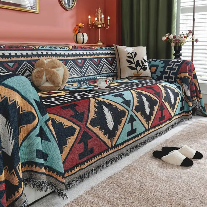 Sofaüberwurf mit Aztekenmuster und Quasten