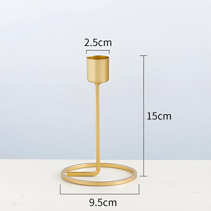 Kerzenhalter aus goldfarbenem Metall