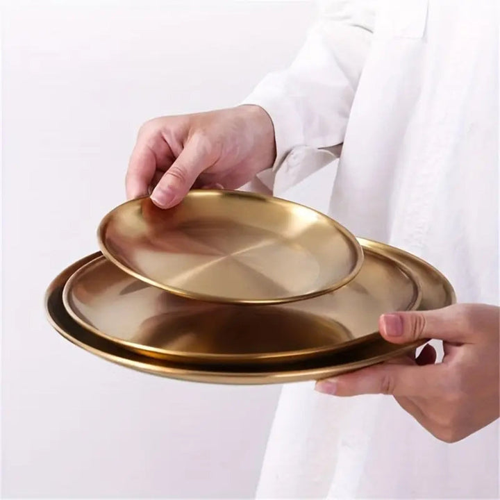 Servierteller aus Edelstahl, goldfarben