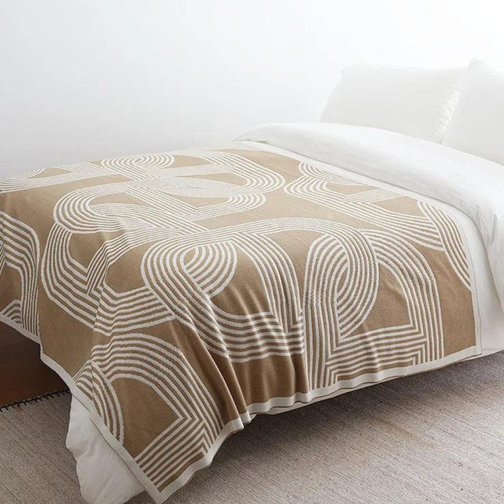 Reversible Strickdecke mit Labyrinthmuster
