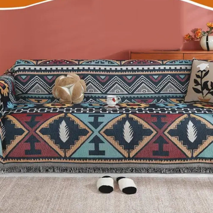 Sofaüberwurf mit Aztekenmuster und Quasten