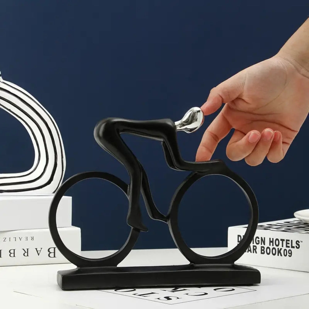 Metallskulptur eines Radfahrers