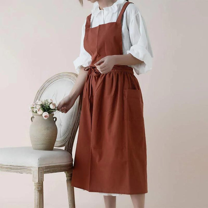 Baumwollschürze mit überkreuzten Trägern und Taschen