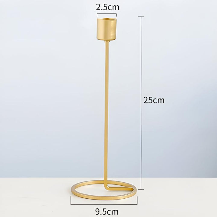 Kerzenhalter aus goldfarbenem Metall