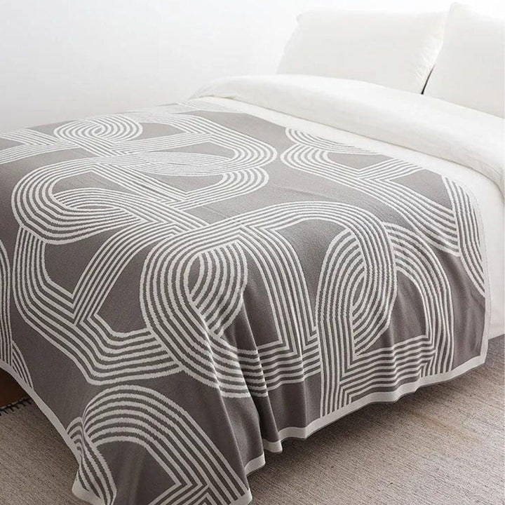 Reversible Strickdecke mit Labyrinthmuster