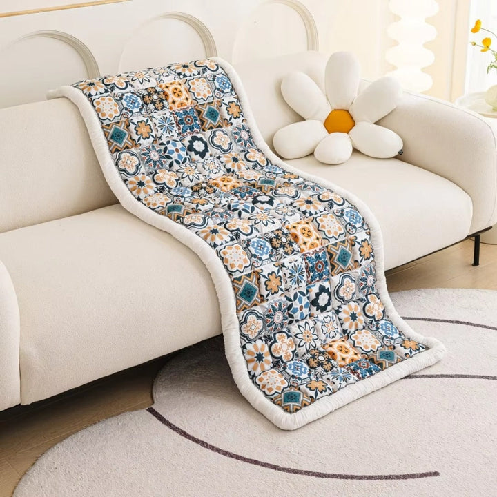 Gesteppte Sofadecke mit Boho-Muster