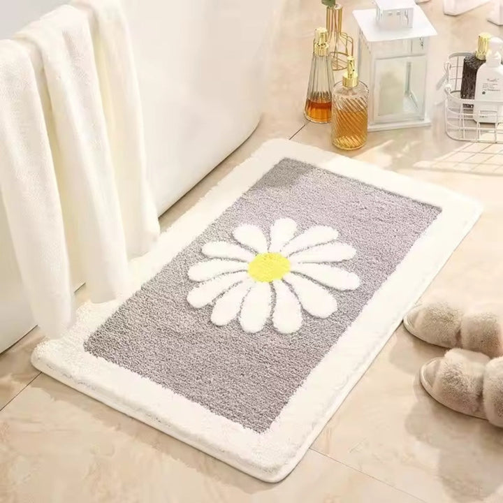 Badteppich mit Gänseblümchenmuster