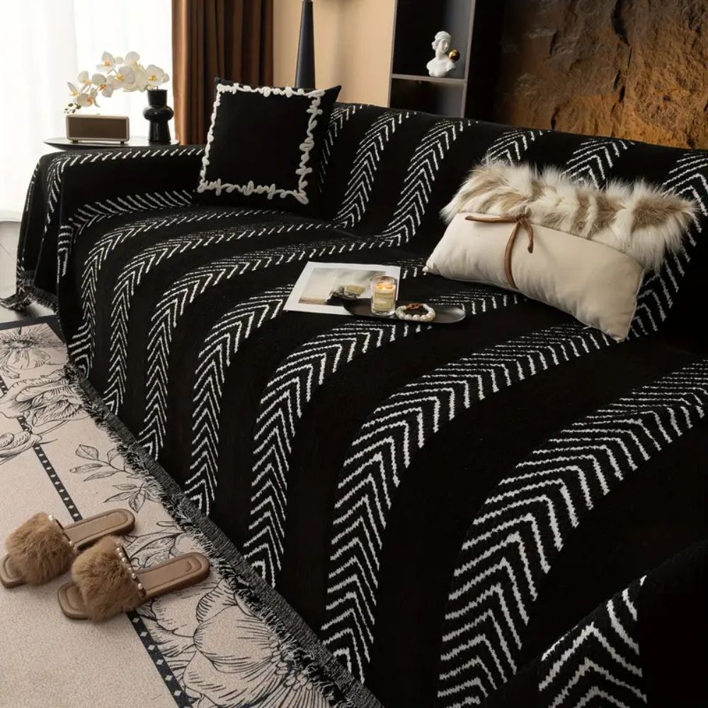 Sofaüberwurf mit Fischgrätmuster und Linien