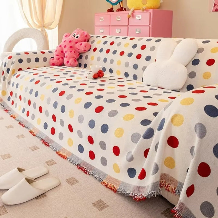 Sofaüberwurf mit Punktmuster