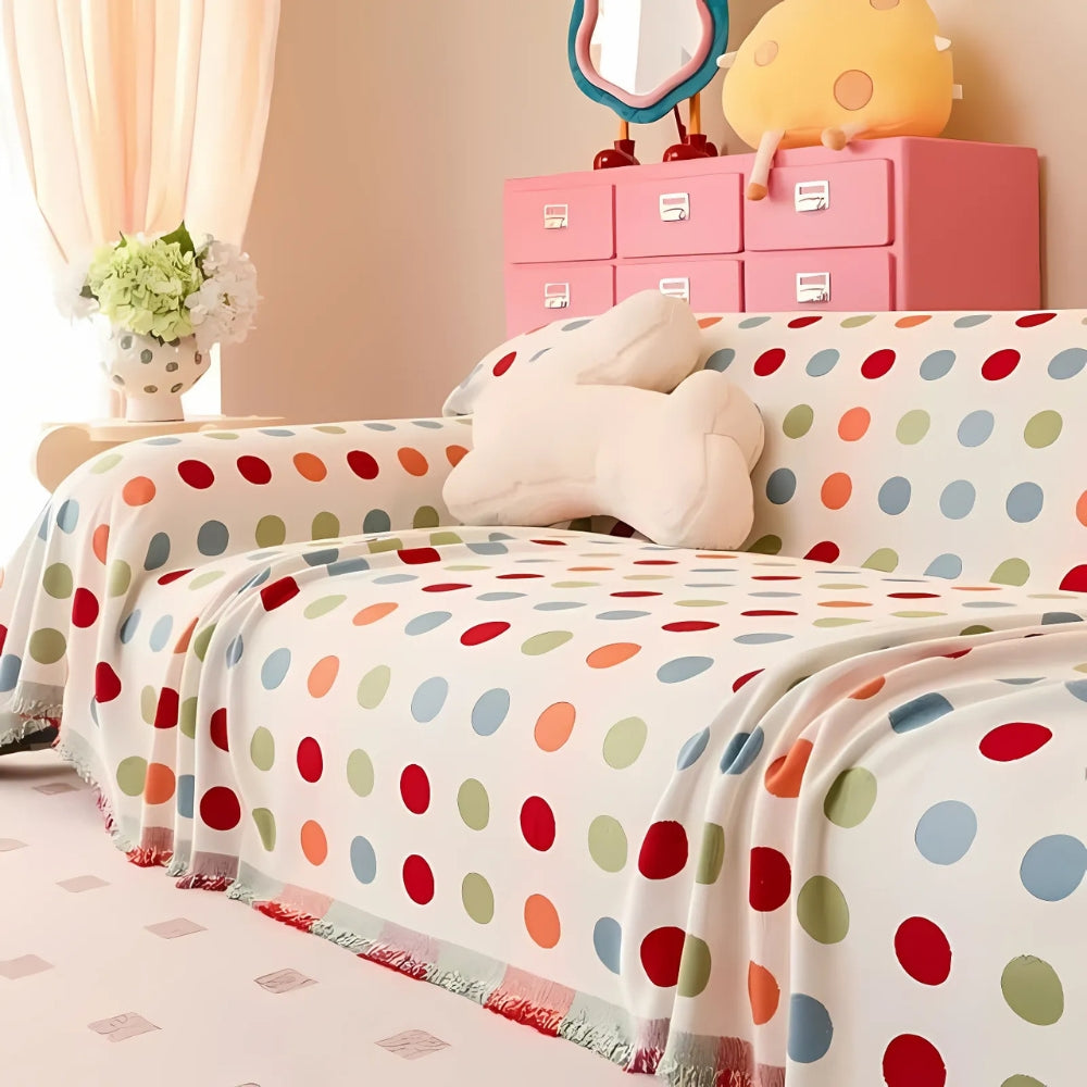 Sofaüberwurf mit Punktmuster