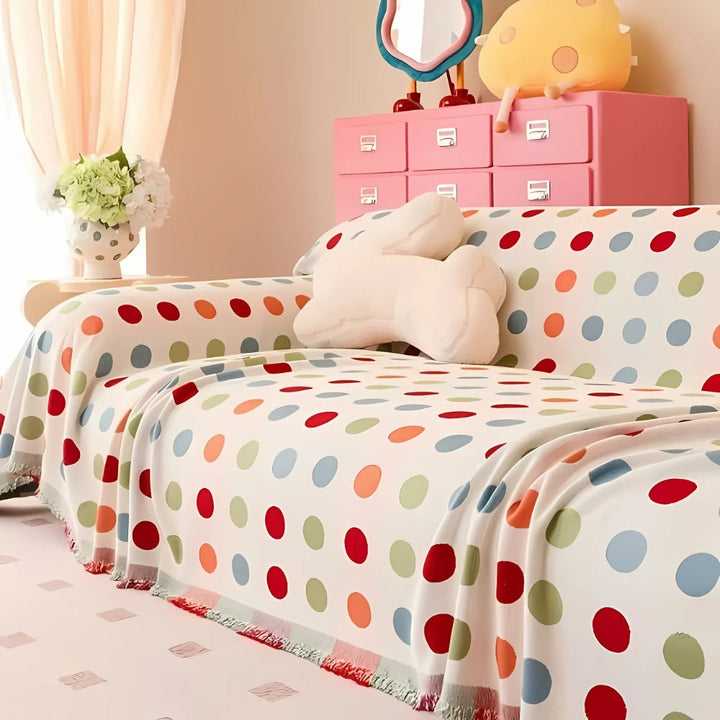 Sofaüberwurf mit Punktmuster