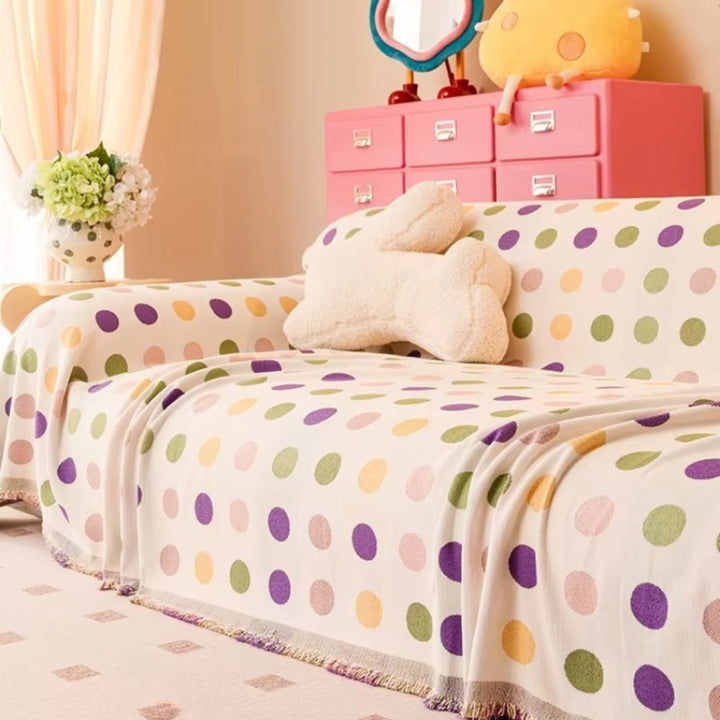 Sofaüberwurf mit Punktmuster