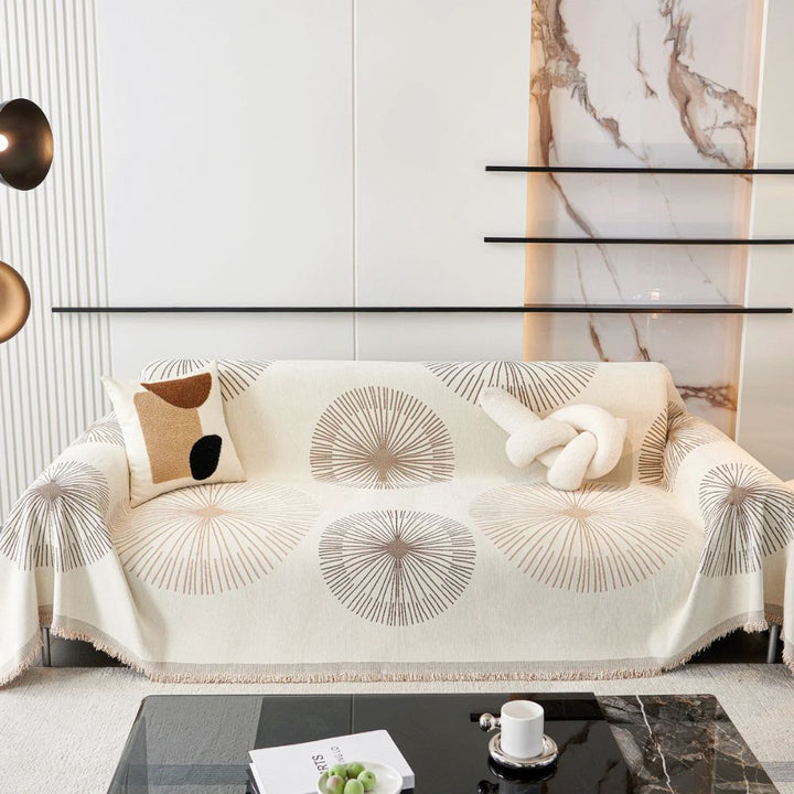 Sofaüberwurf mit Pusteblumen und Quasten