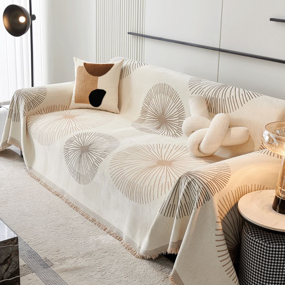 Sofaüberwurf mit Pusteblumen und Quasten