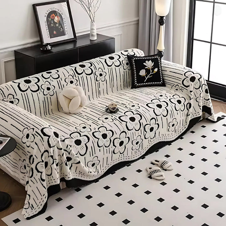 Sofaüberwurf mit Blumenstickerei