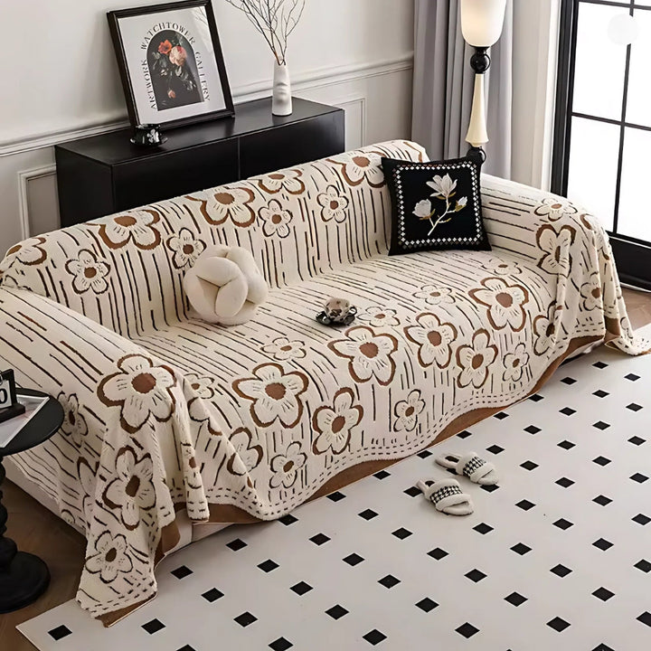 Sofaüberwurf mit Blumenstickerei