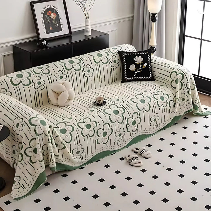 Sofaüberwurf mit Blumenstickerei