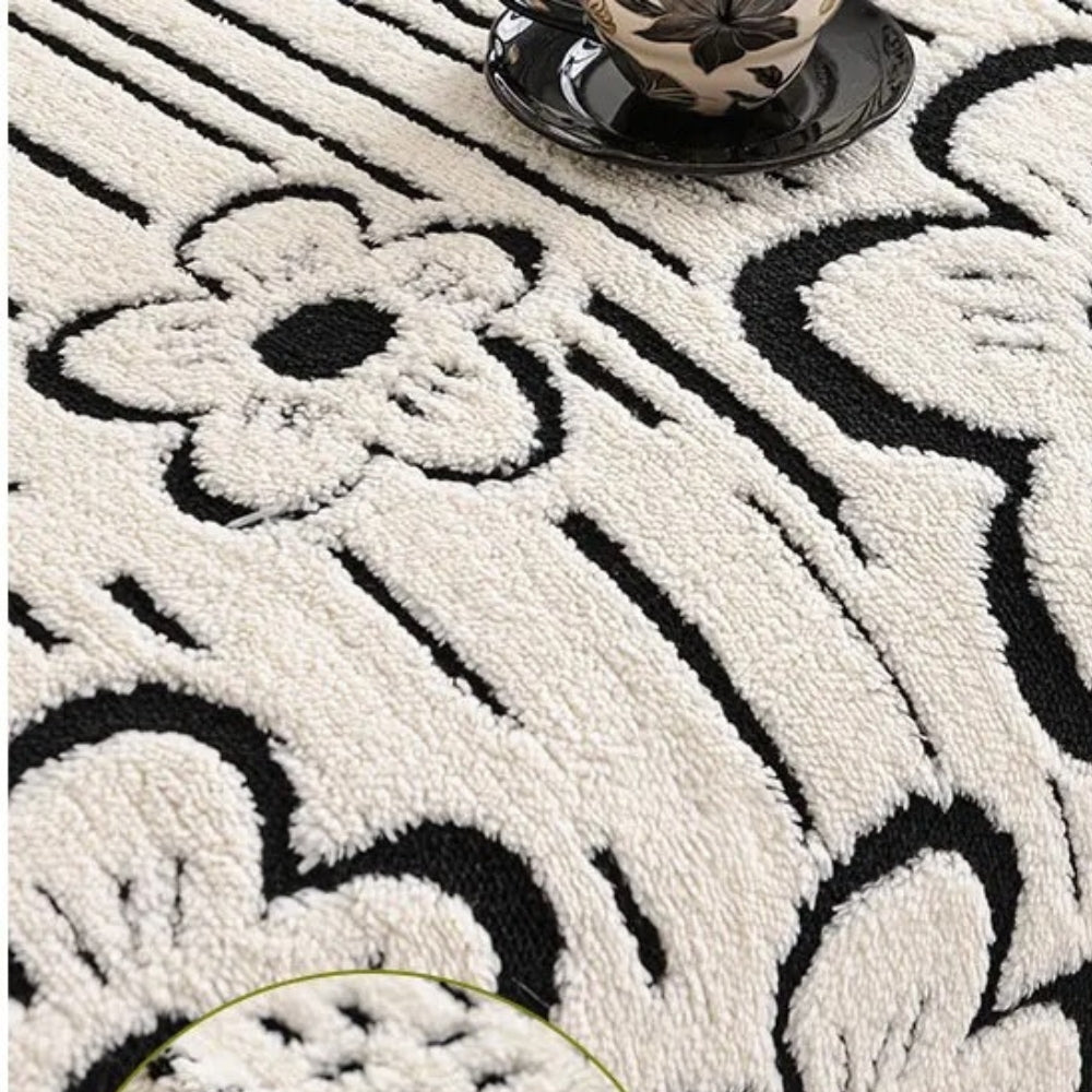 Sofaüberwurf mit Blumenstickerei