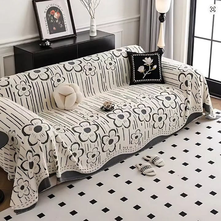 Sofaüberwurf mit Blumenstickerei