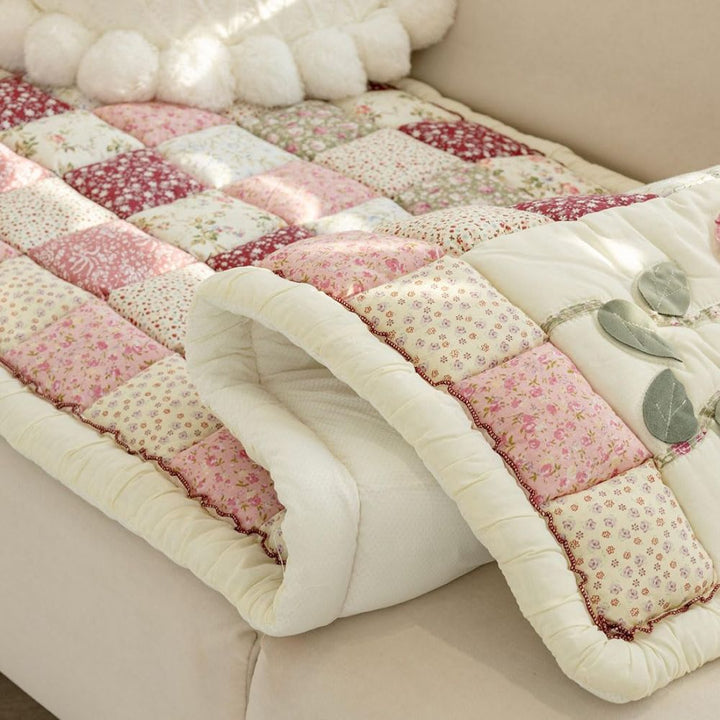 Gesteppter Sitzüberwurf mit Blumenmuster