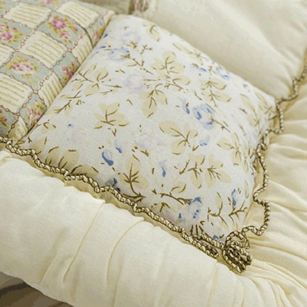 Gesteppter Sitzüberwurf mit Blumenmuster