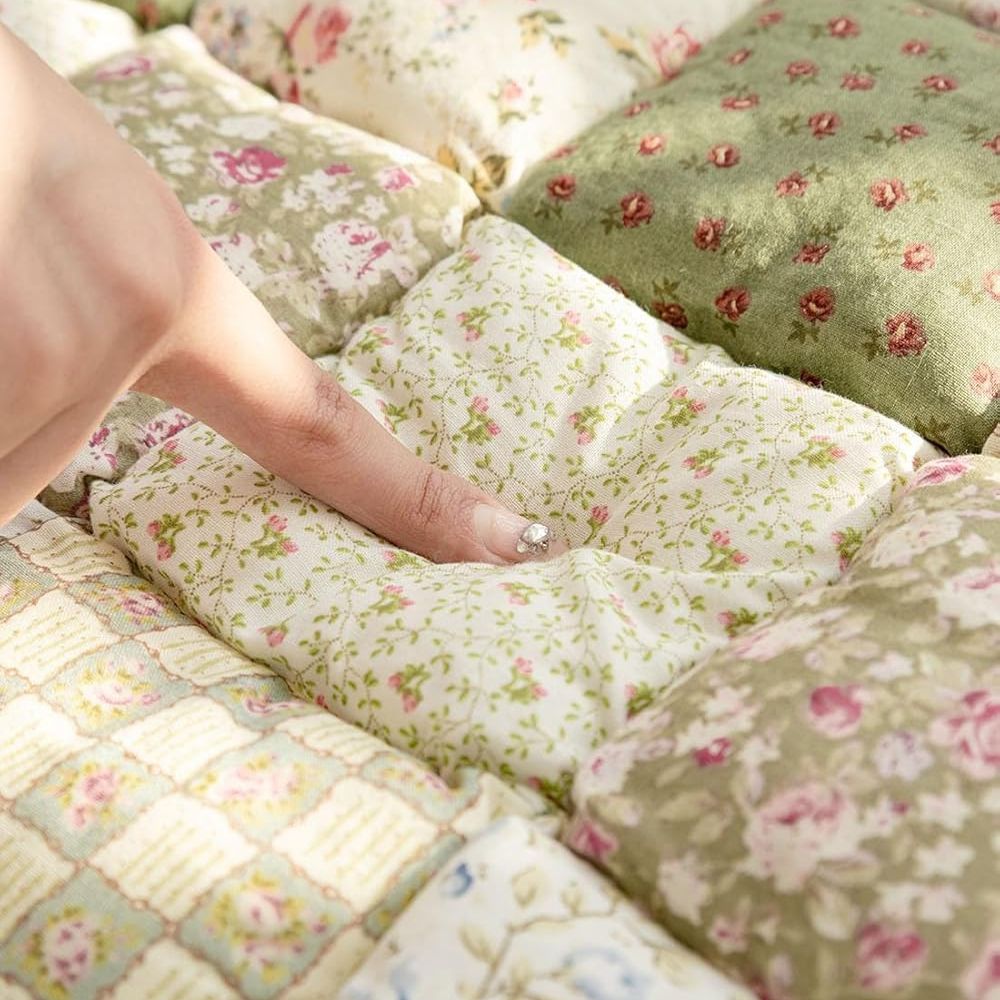 Gesteppter Sitzüberwurf mit Blumenmuster