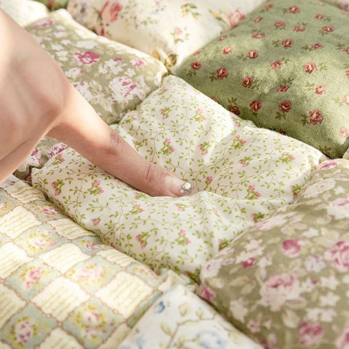 Gesteppter Sitzüberwurf mit Blumenmuster