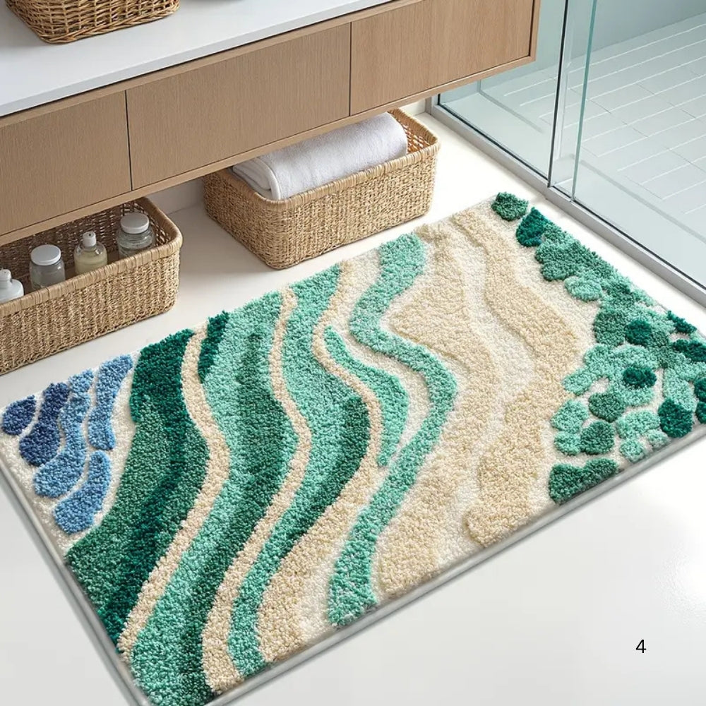 Badematte mit blauem Wellenmuster