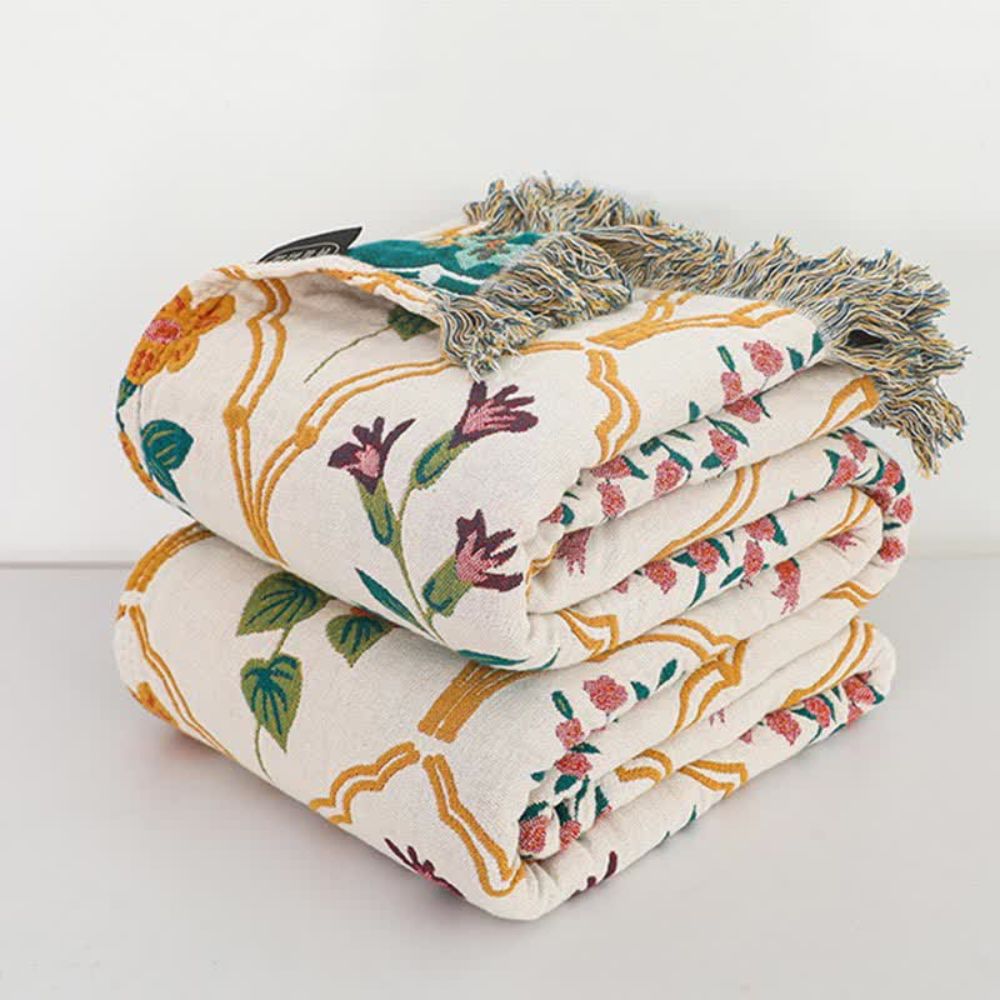 Baumwoll-Jacquarddecke mit floralen Rauten