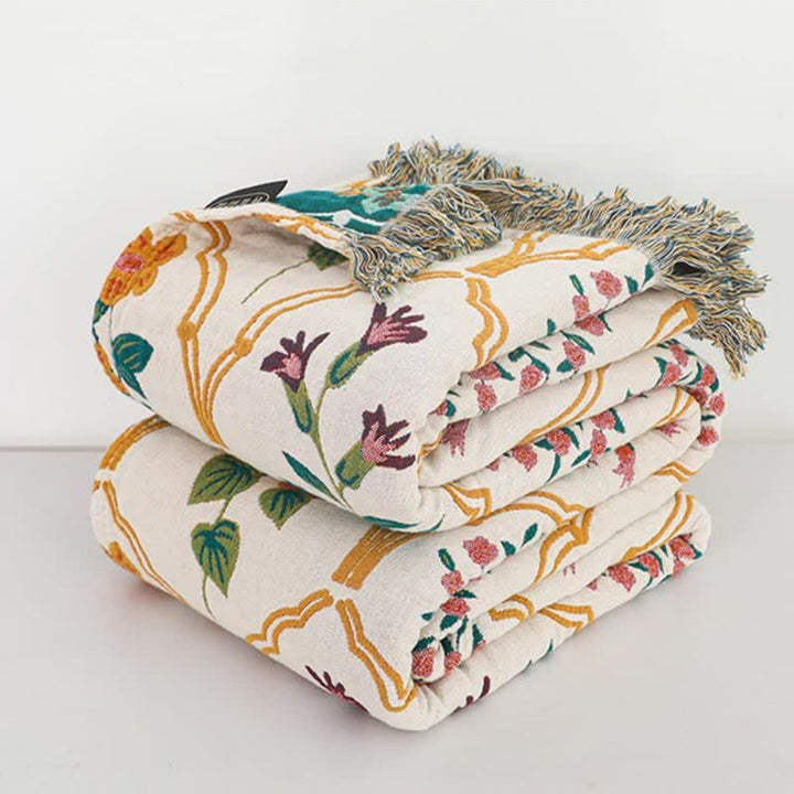 Baumwoll-Jacquarddecke mit floralen Rauten