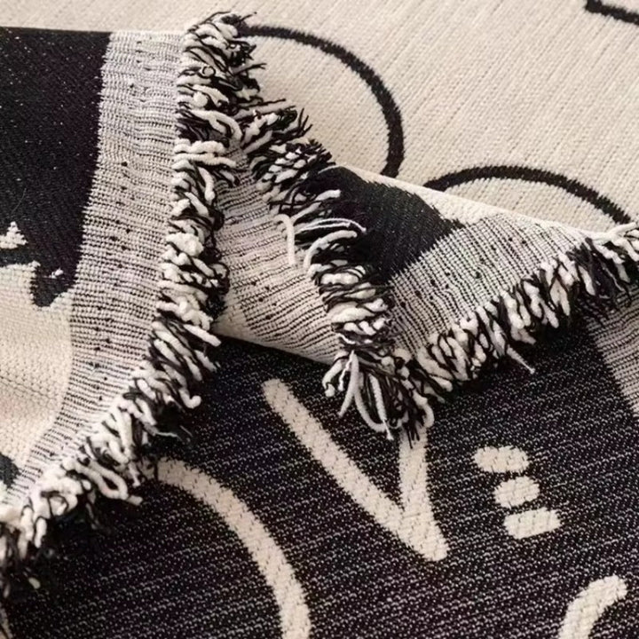 Sofadecke aus Chenille mit Comic-Muster