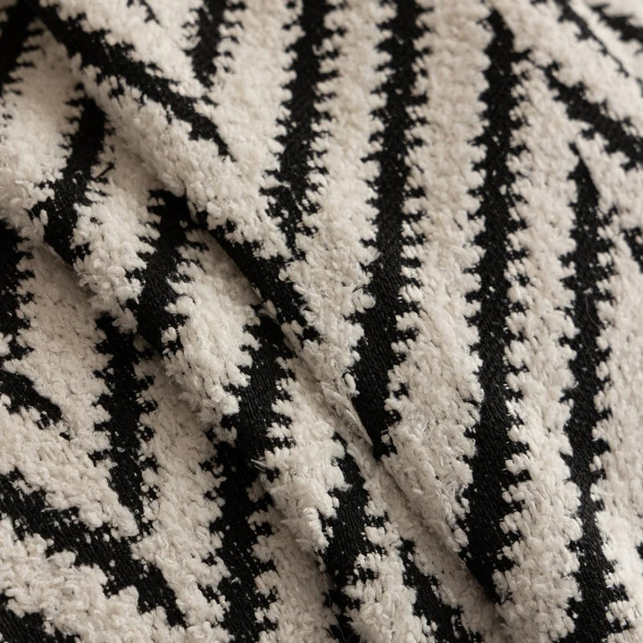 Boho-Stricksofadecke mit Quasten