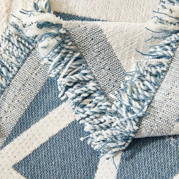 Chenille-Sofawurf mit Labyrinthmuster und Quasten